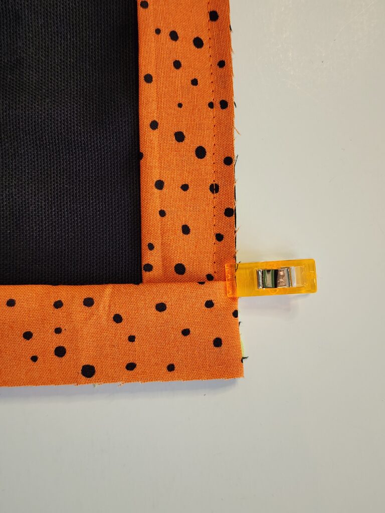 binding along lower edge of tote