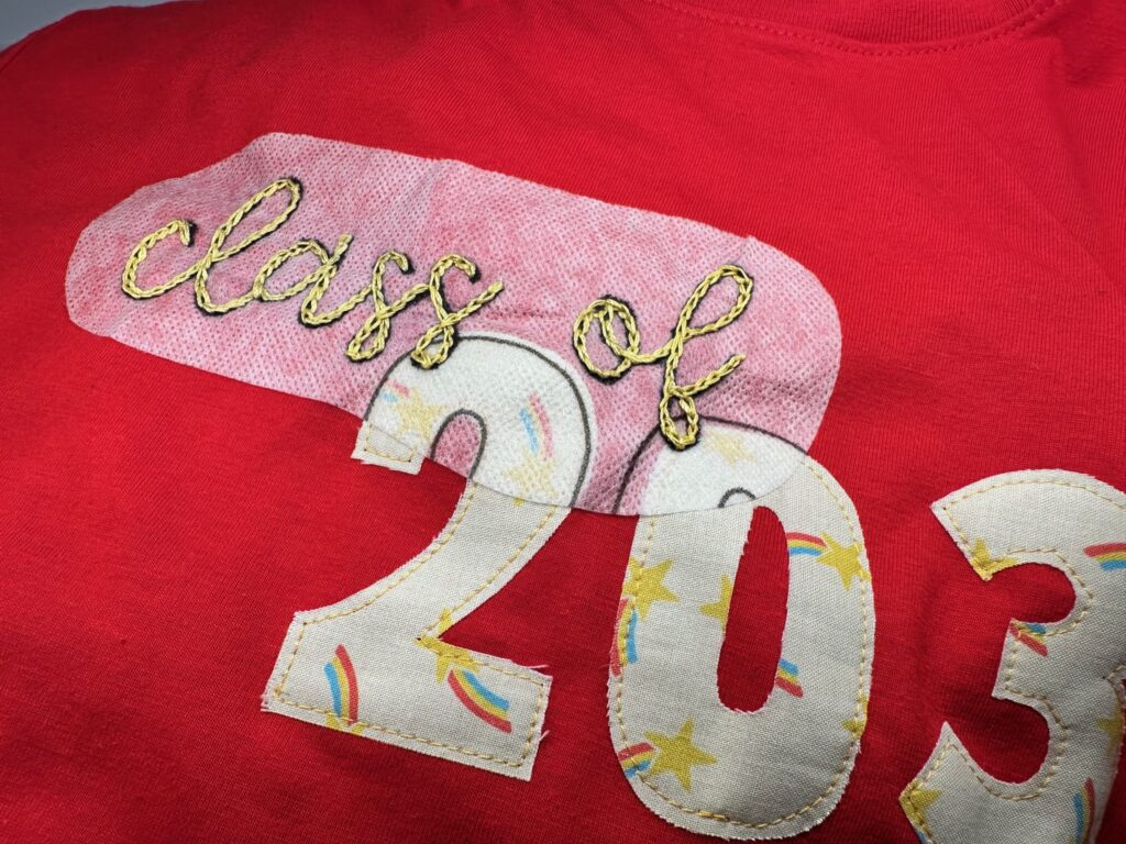 finished hand embroidery on back to school tee