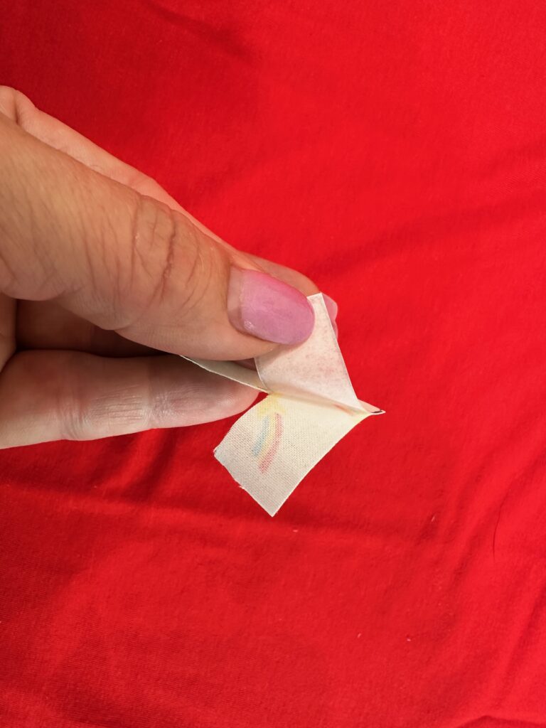 peel off paper backing of applique numbers