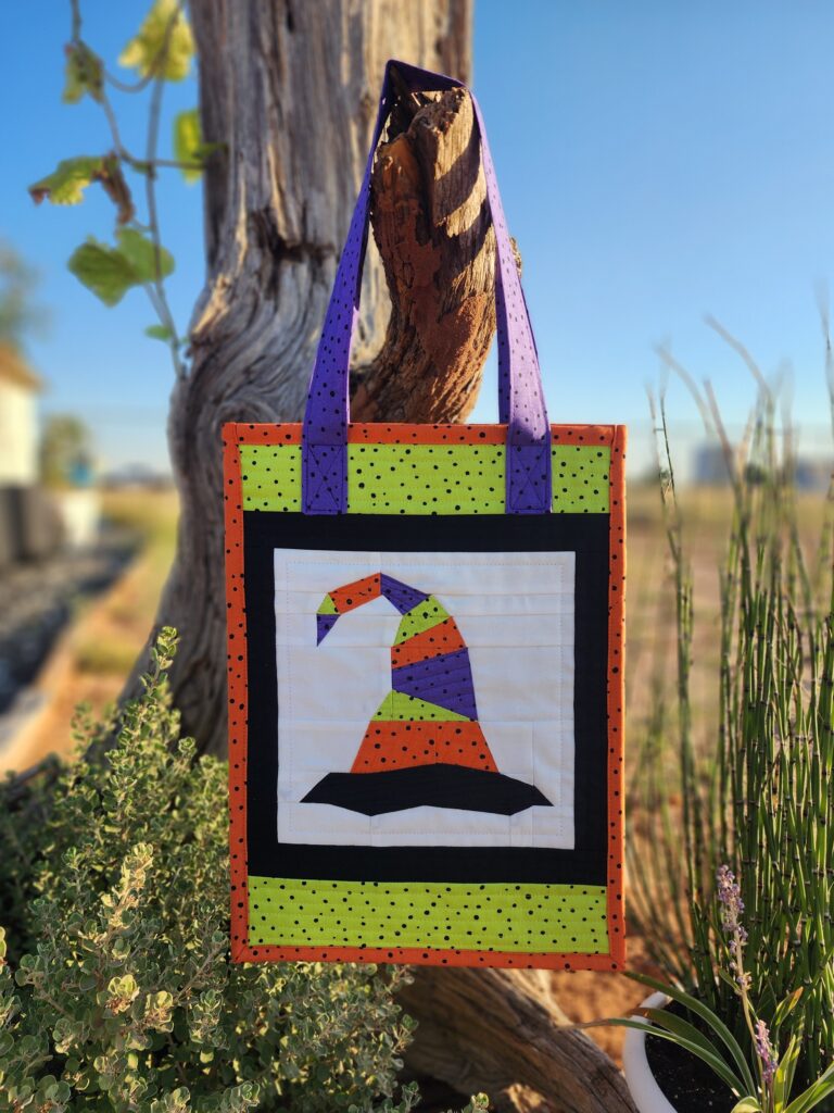 witch tote on tree