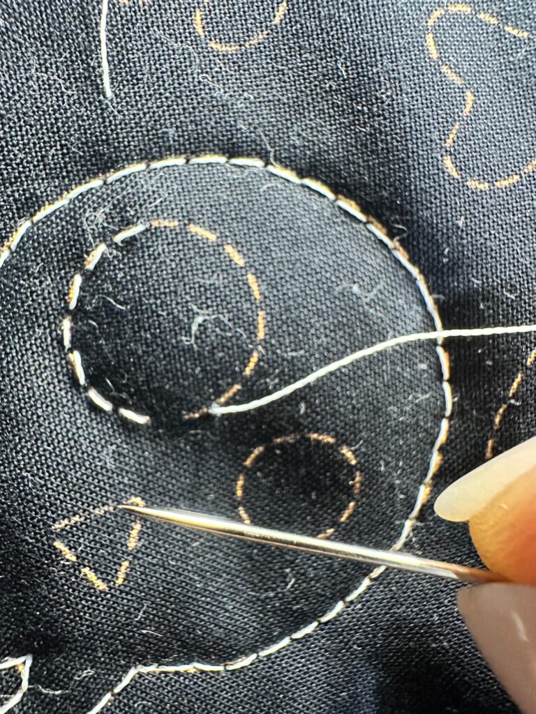 hand quilting with Sulky Glowy