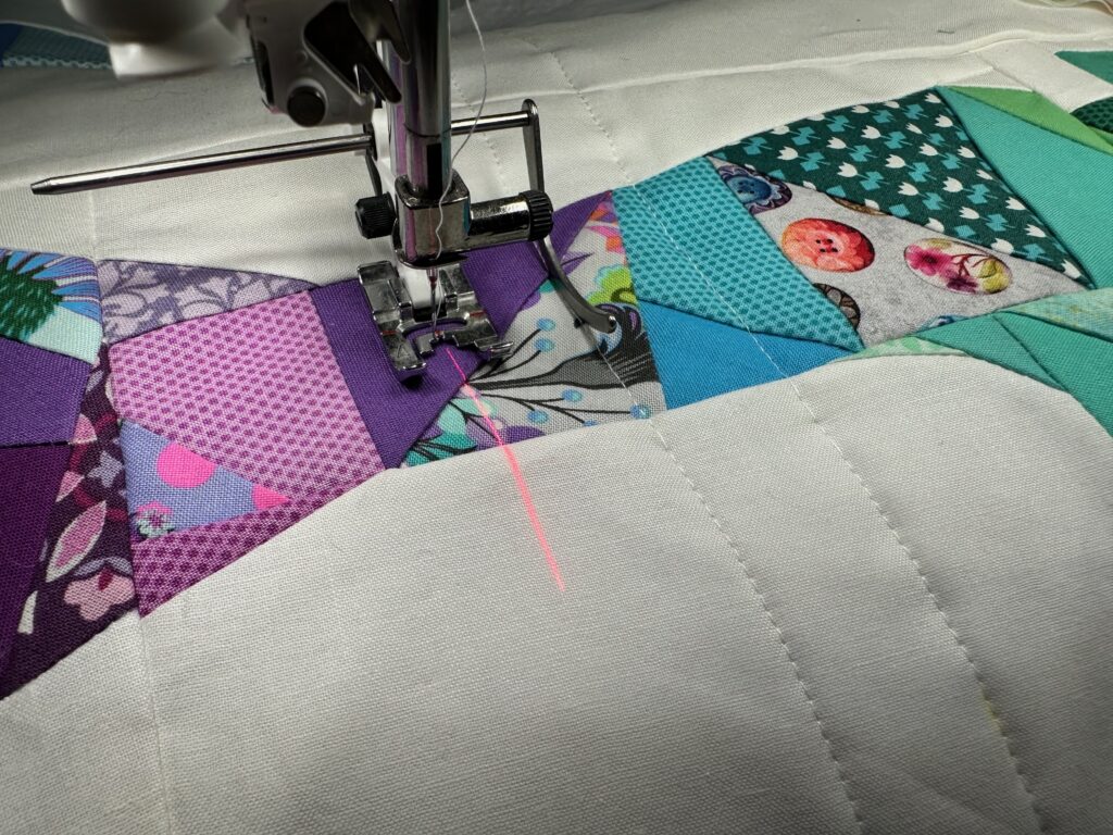 quilting the pieced sewing machine piece