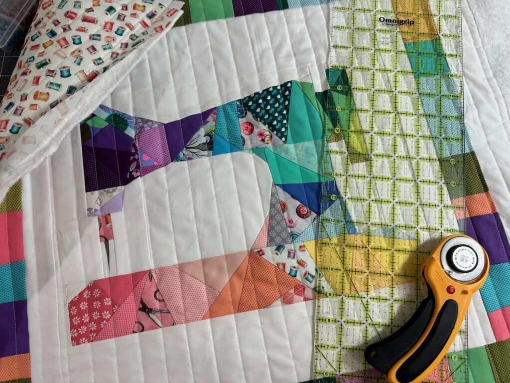 quilted wall hanging with ruler
