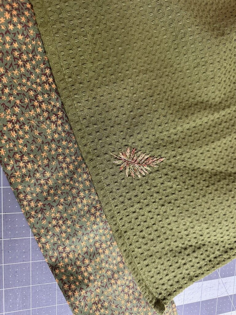 fabric band stitched to towel