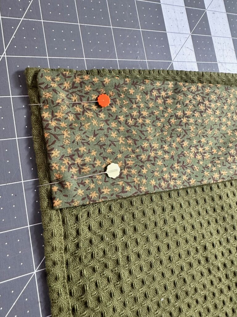 pinned side edges of fabric band