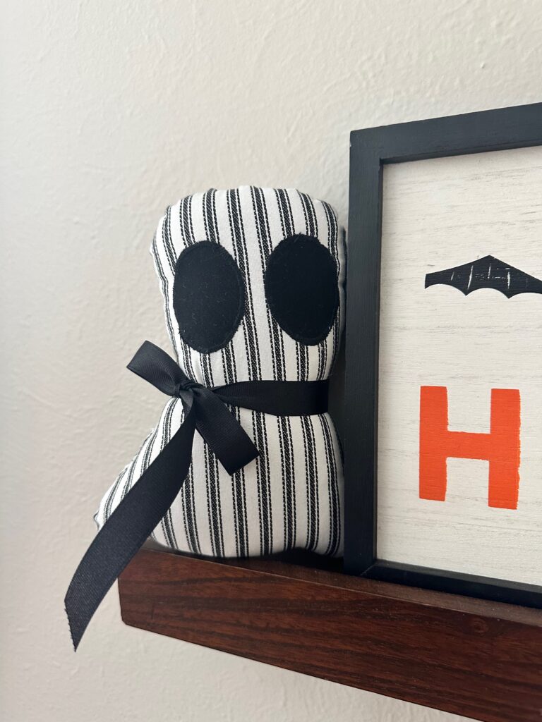 ghost shelf pillow with Halloween sign