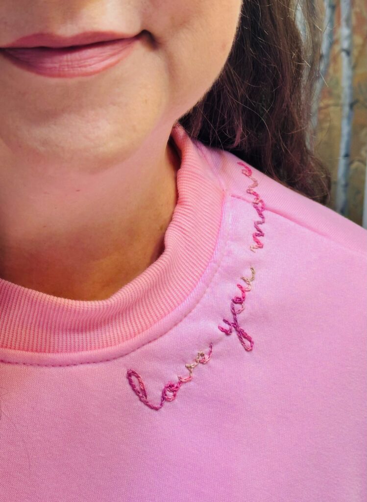 finished sweatshirt with neckline embroidery