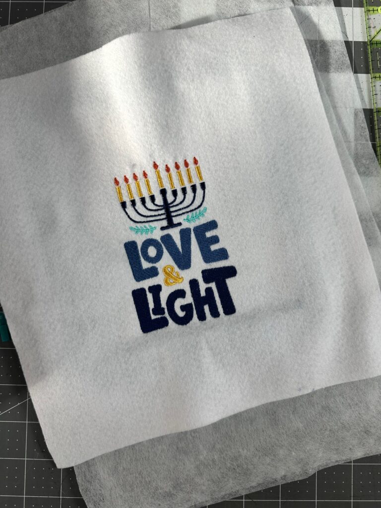finished machine embroidery design in hoop for Hanukkah Shelf Pillow