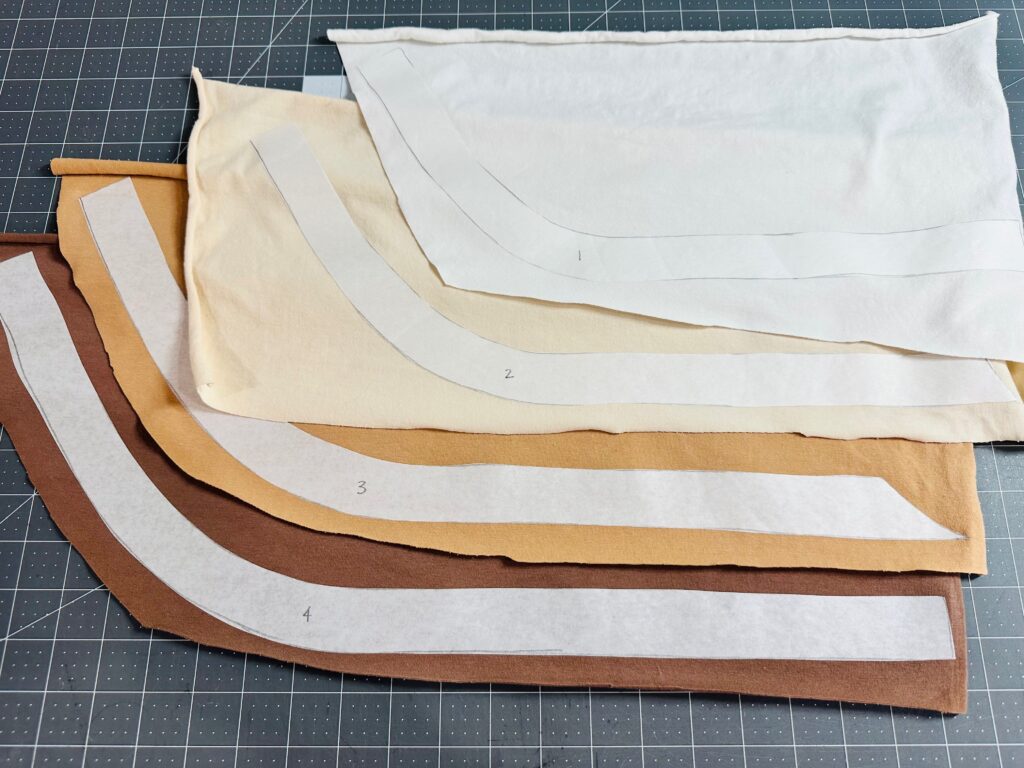 all fabrics fused to perfect appliqué stripes