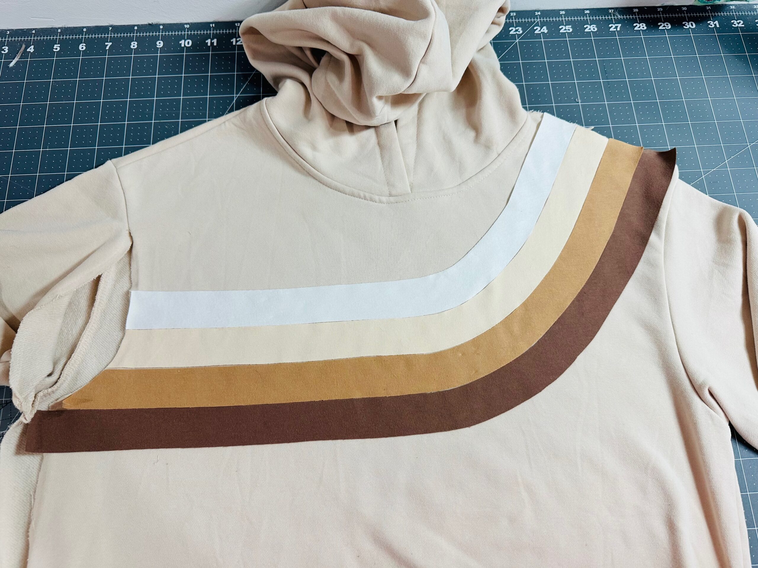 fabric stripes placed on sweatshirt