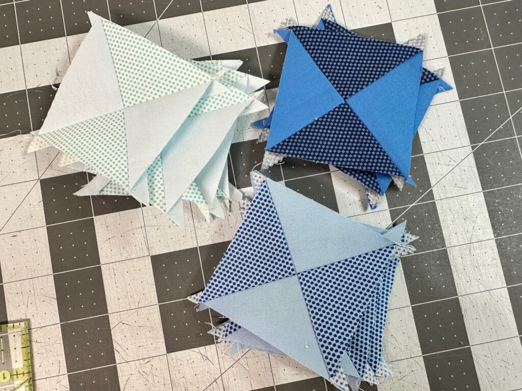 finished hourglass blocks for shelf pillow