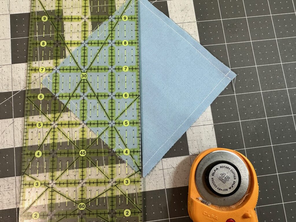 cut a diagonal line across stitched square