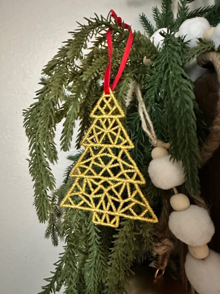 finished metallic freestanding lace ornament