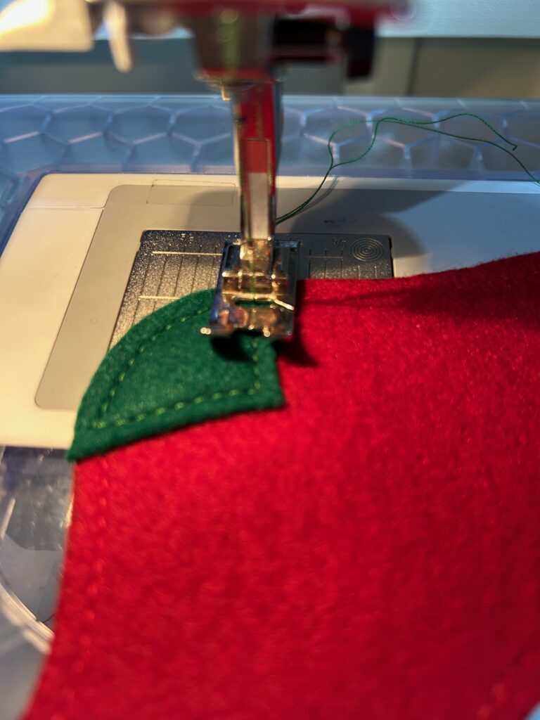stitching Santa's sock