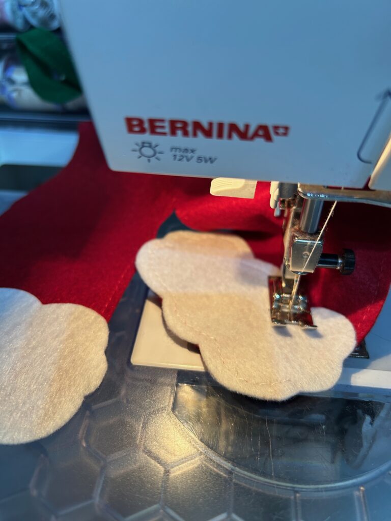 stitching Santa's pants