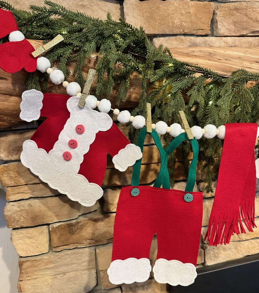 Santa's Wardrobe Garland on mantel