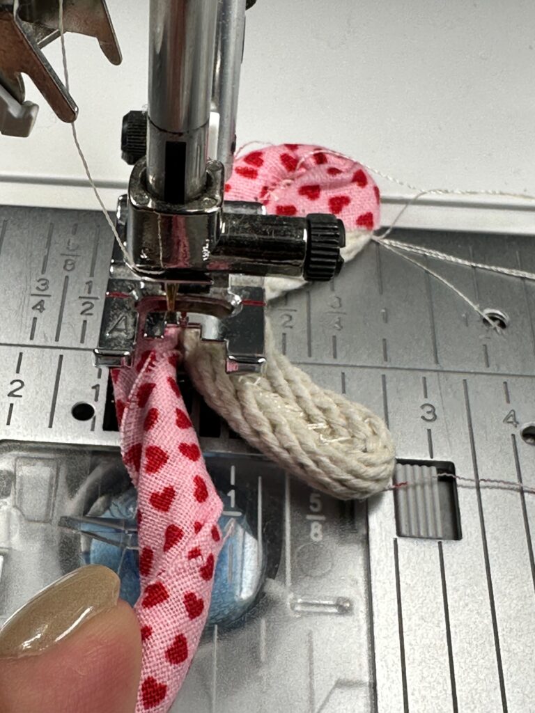 adding fabric wrapped rope to heart rope shape