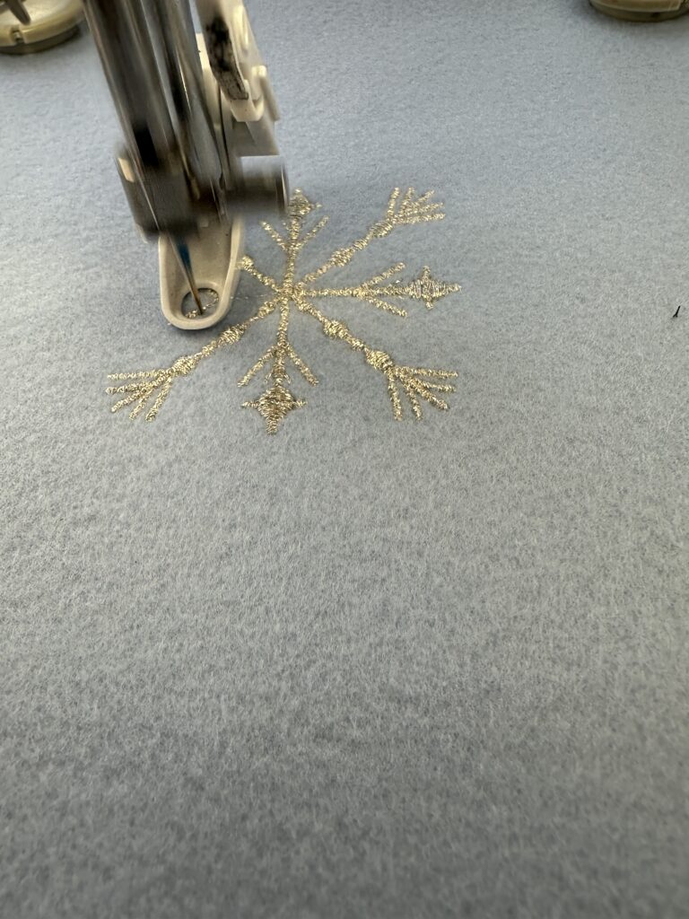 snowflake on blue felty