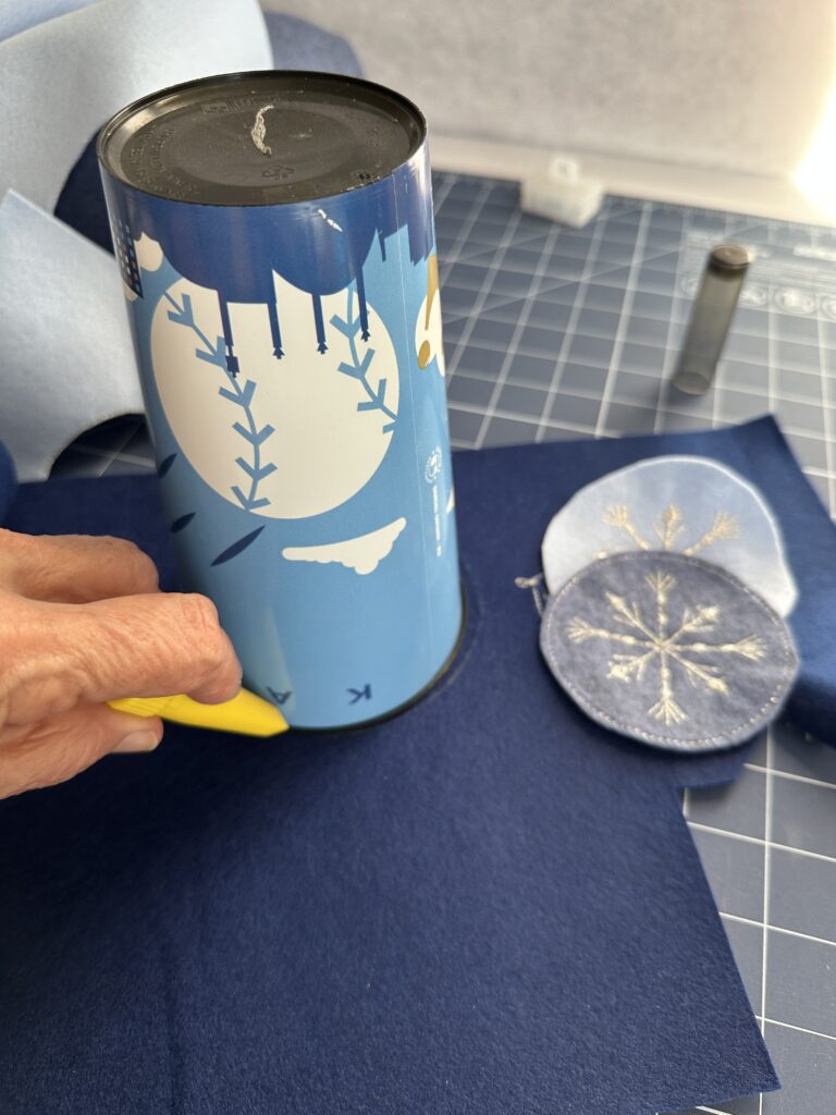 cutting out circle for snowflake ornament