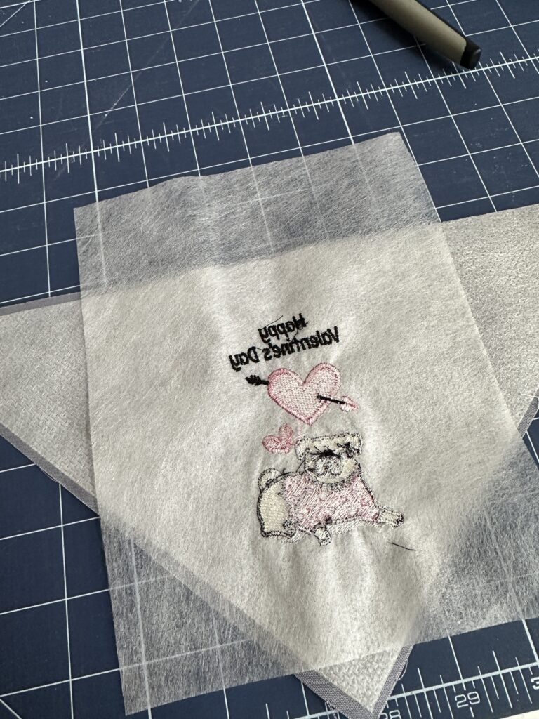 finished back of embroidery for dog bandana