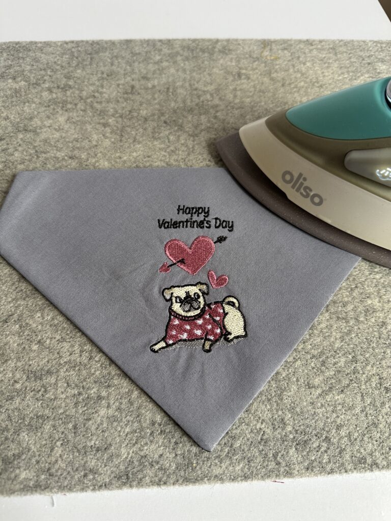 pressing dog bandana after turning