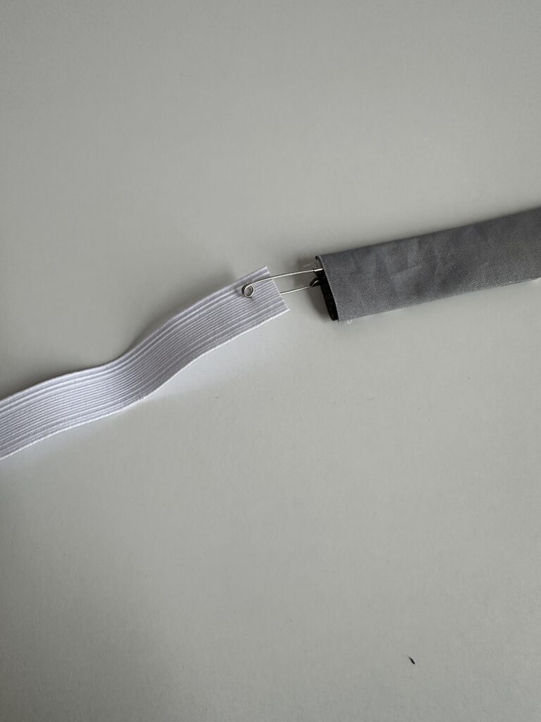 insert elastic into band using safety pin