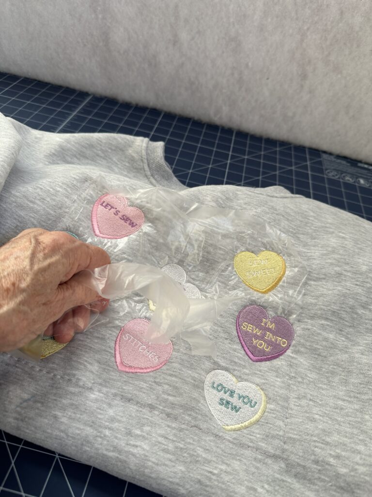 tearing away solvy from sweatshirt