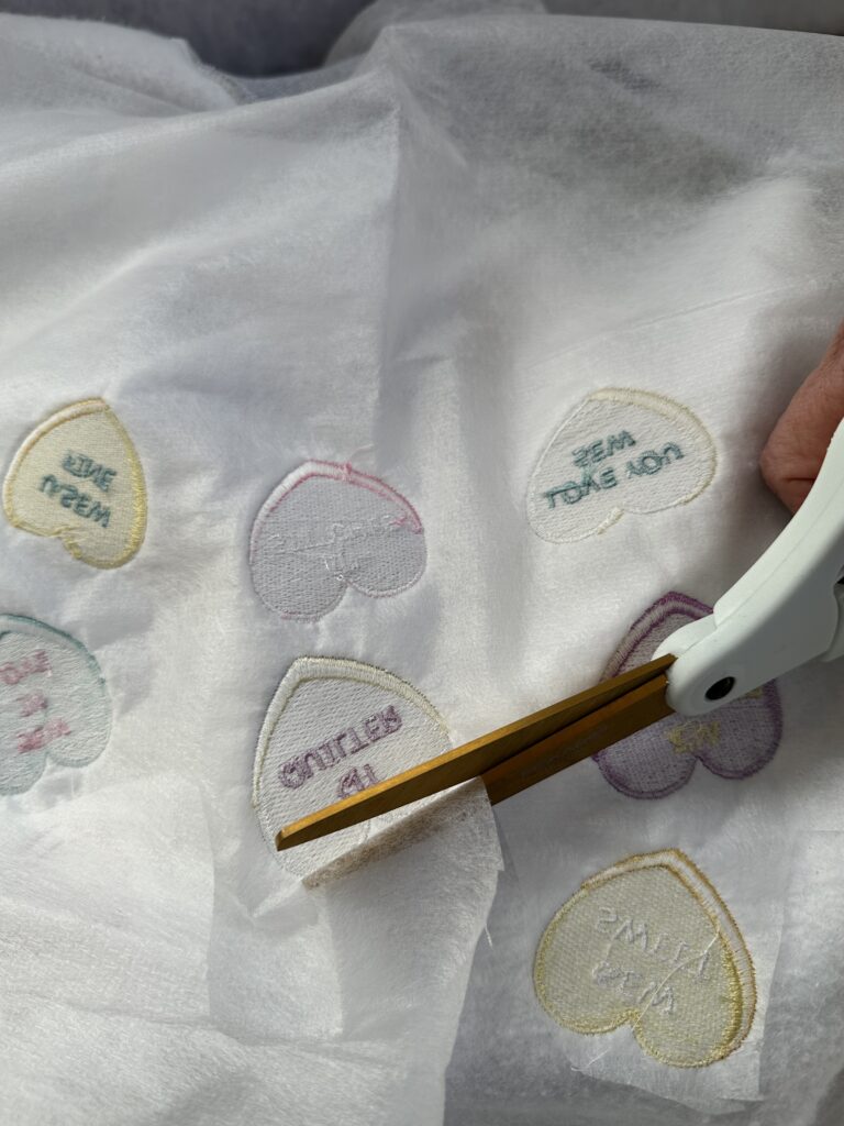 trimming excess soft n sheer stabilizer from sweatshirt wrong side