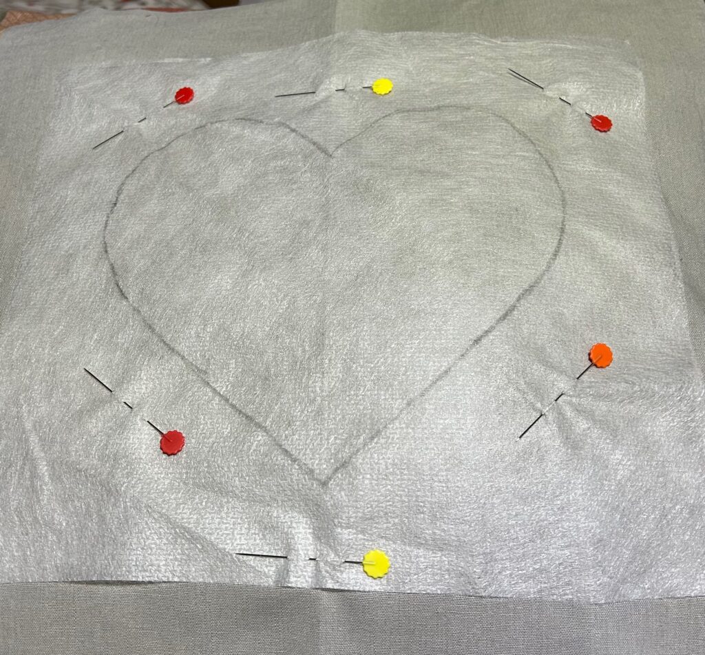 rememberance pillow with Soft n Sheer pinned to right side of fabric