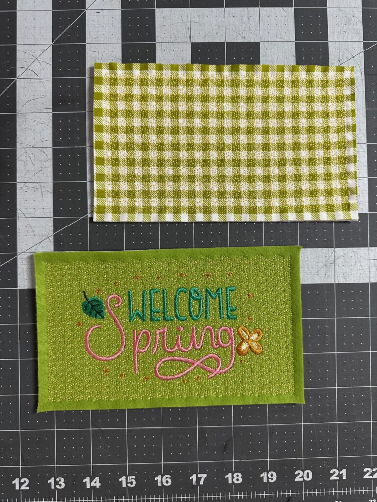 front and back of sign trimmed on table