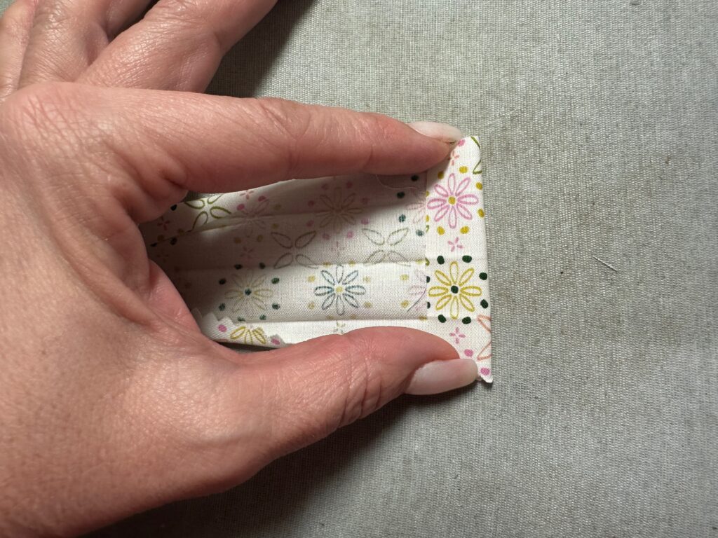 tie ends concealed in fold