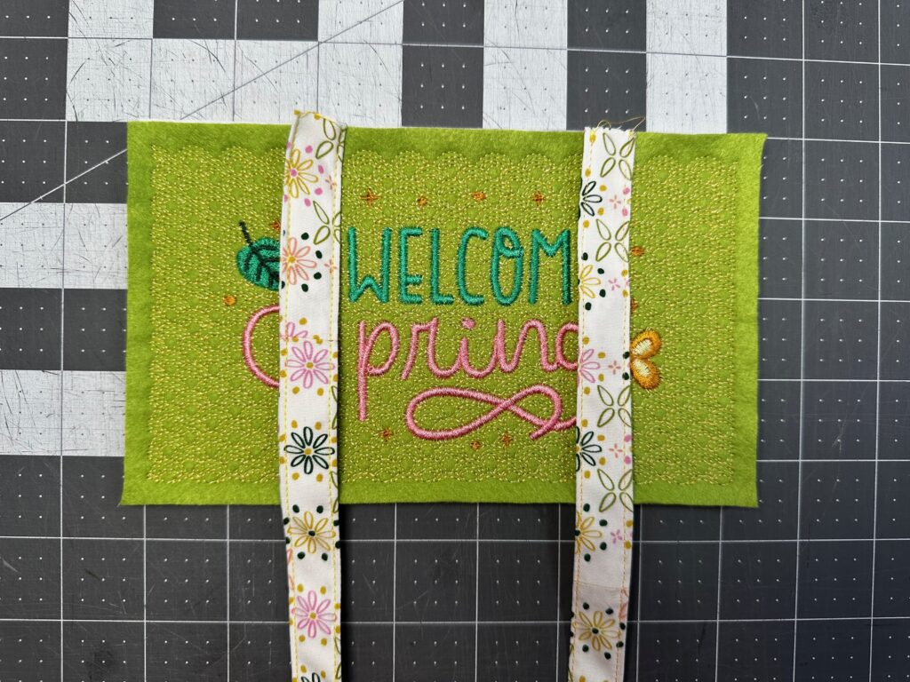 positioning ties onto sign