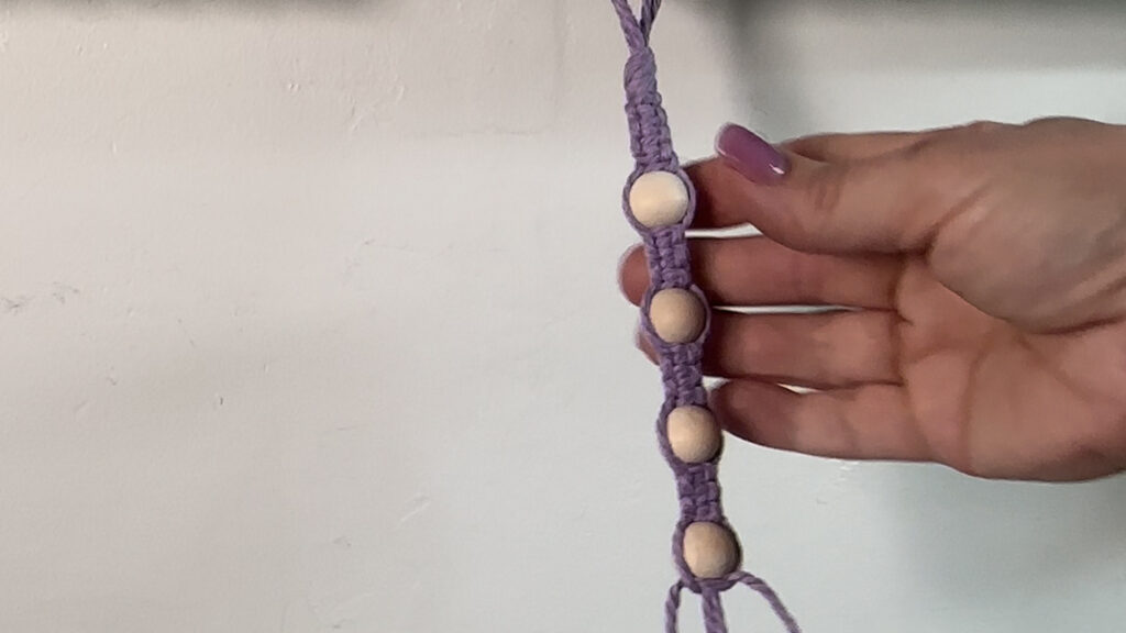 four beads added to macrame handles