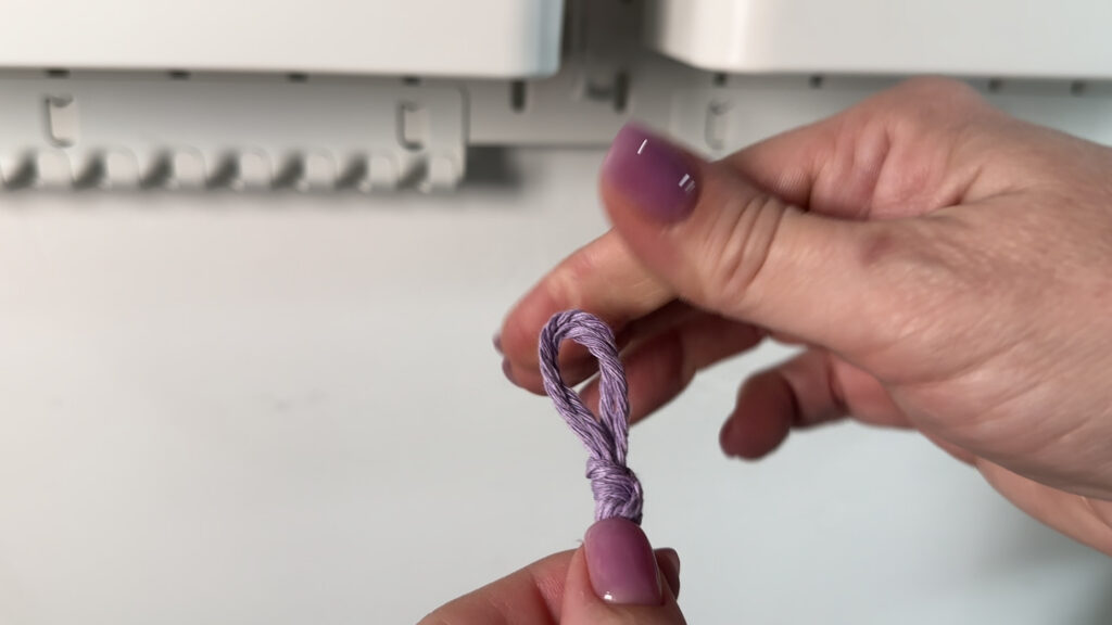 knotting handle loops together