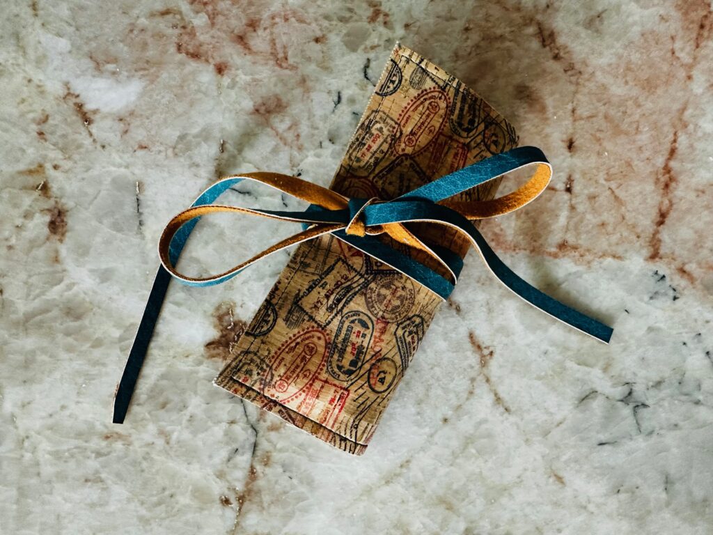 rolled up project with items inside