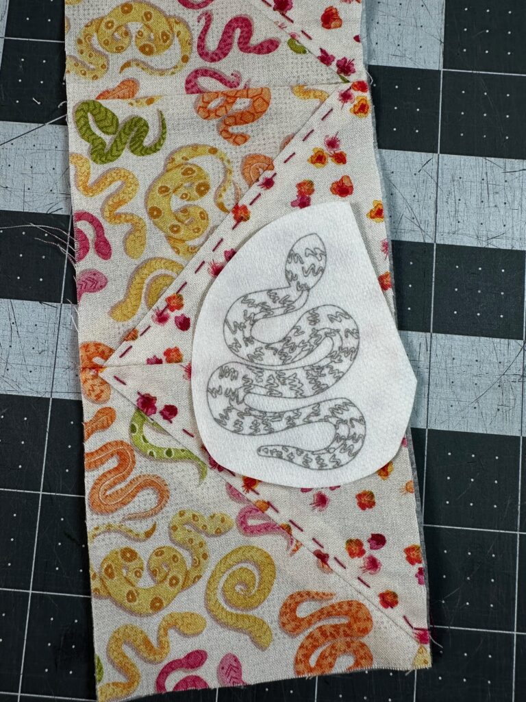 placing Stick 'n Stitch Transfer before applying to pieced fabric