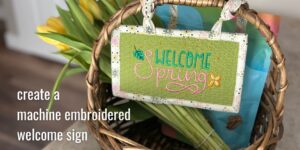 machine embroidered welcome spring sign