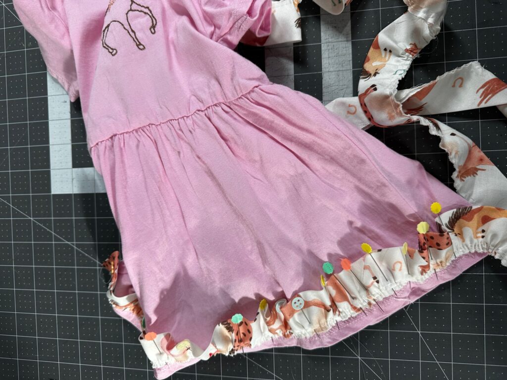 pins all along dress hem