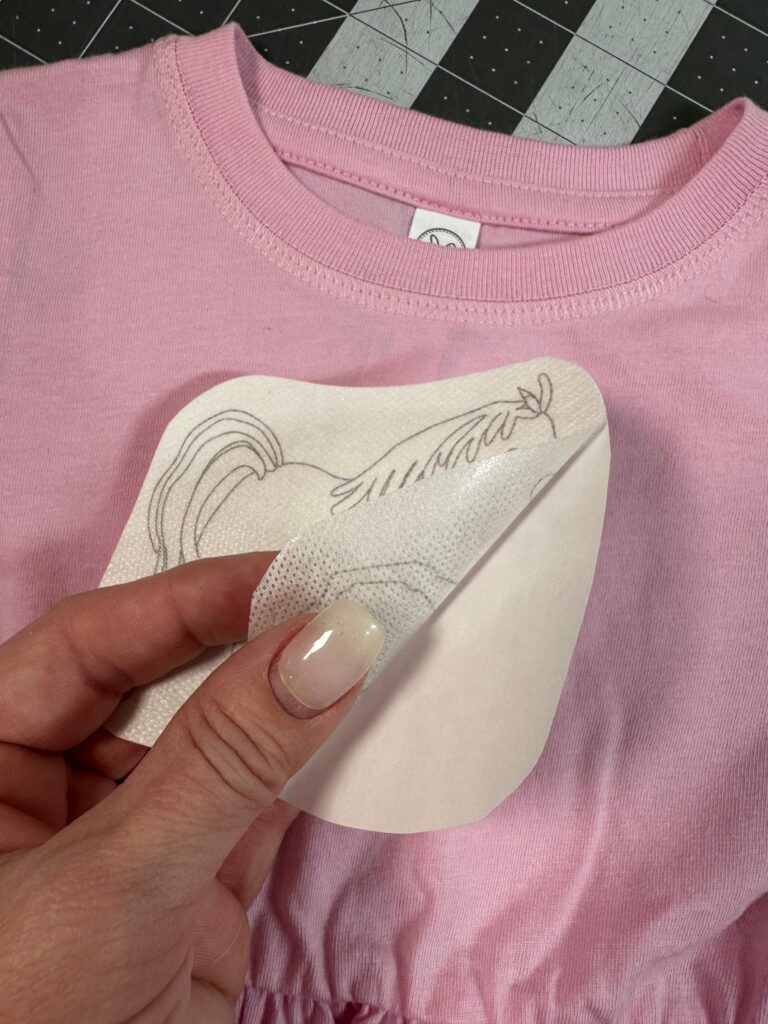 applying Transfer Sticker to dress