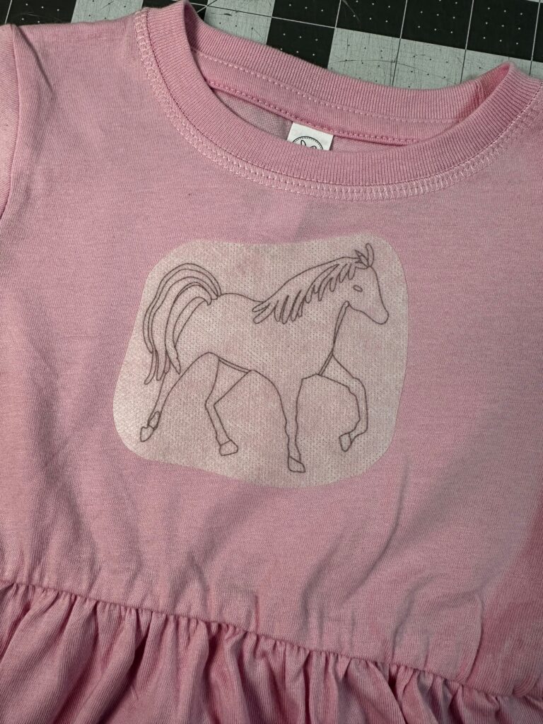 sticker placed on dress