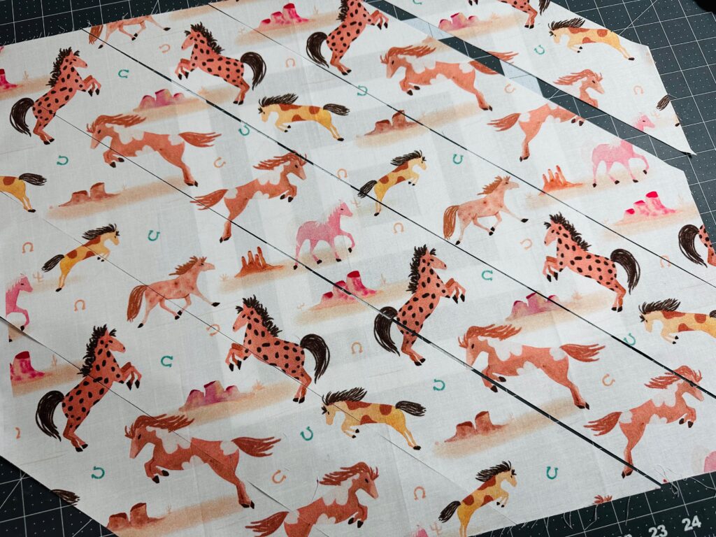 cutting ruffle fabric strips on the bias