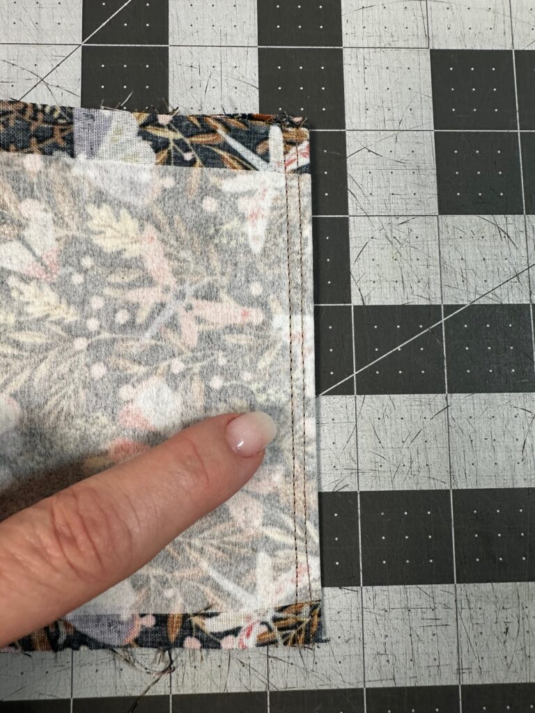 French seam enclosing coin purse pocket raw edge