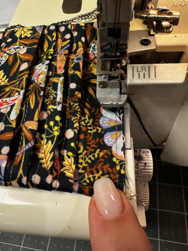 serging short ends of clasp frame wallet