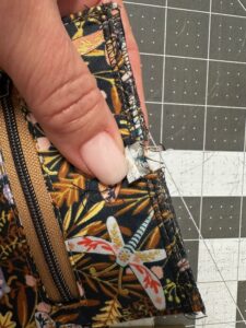 cut away interior fabrics at slot opening