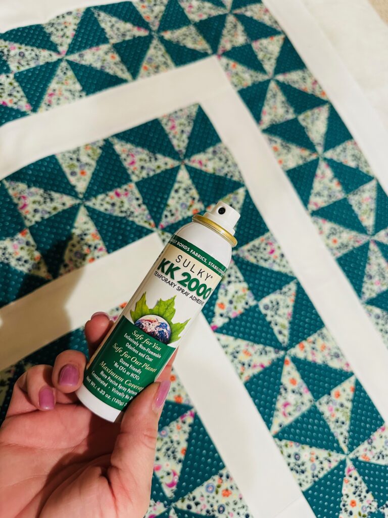 pinwheel block being spray basted