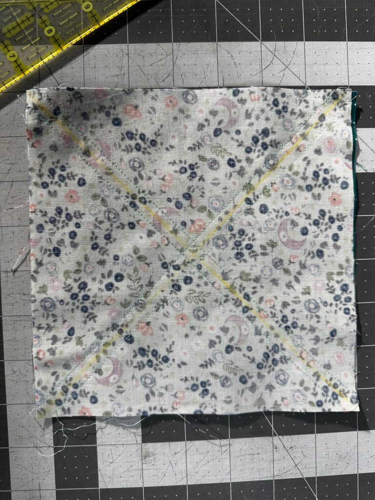 sew along marked line to create HSTs