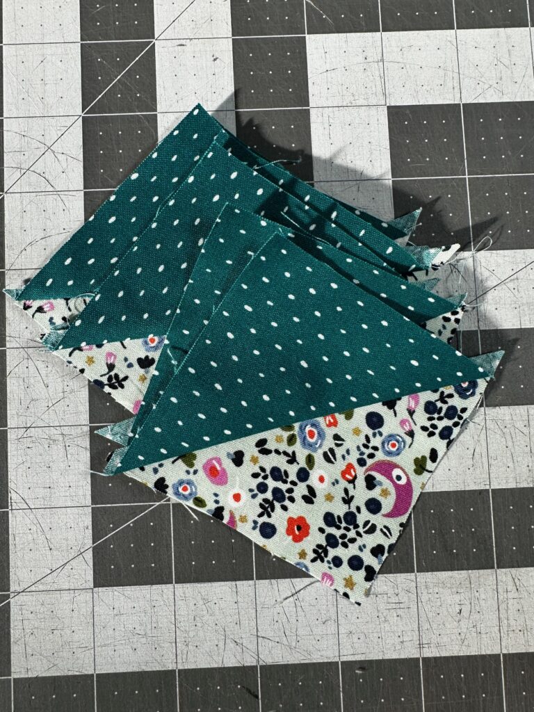 HSTs stacked and ready for piecing into block