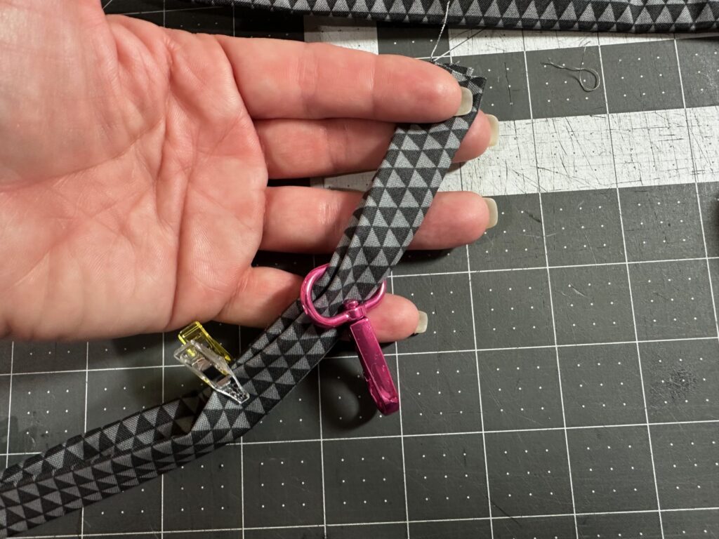 adding D-ring swivel clip to lanyard