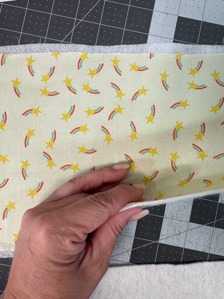 layering backing over insulated batting