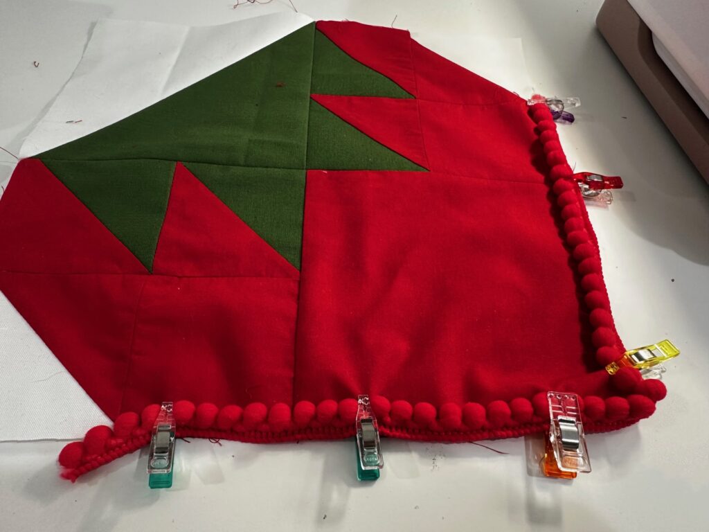 Strawberry block with pompom fringe